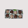 Eight-piece box of Saratoga Chocolate Co. St. Patrick’s Day truffles featuring Irish Cream and Irish Coffee flavors. Includes milk chocolate Irish Cream truffles with white chocolate drizzle and dark chocolate Irish Coffee truffles topped with coffee sugar sprinkles.