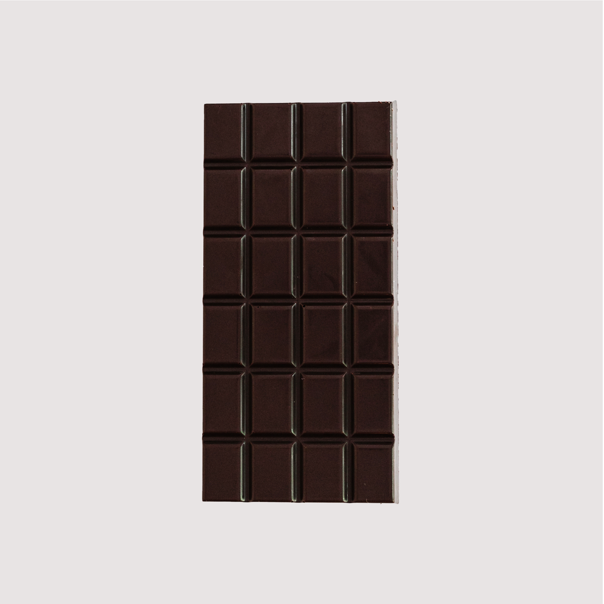 Unwrapped Saratoga Chocolate Co. Fleur de Sel Bar, front side showing a glossy dark chocolate surface divided into 24 square segments. This bar is vegan, gluten and dairy free.