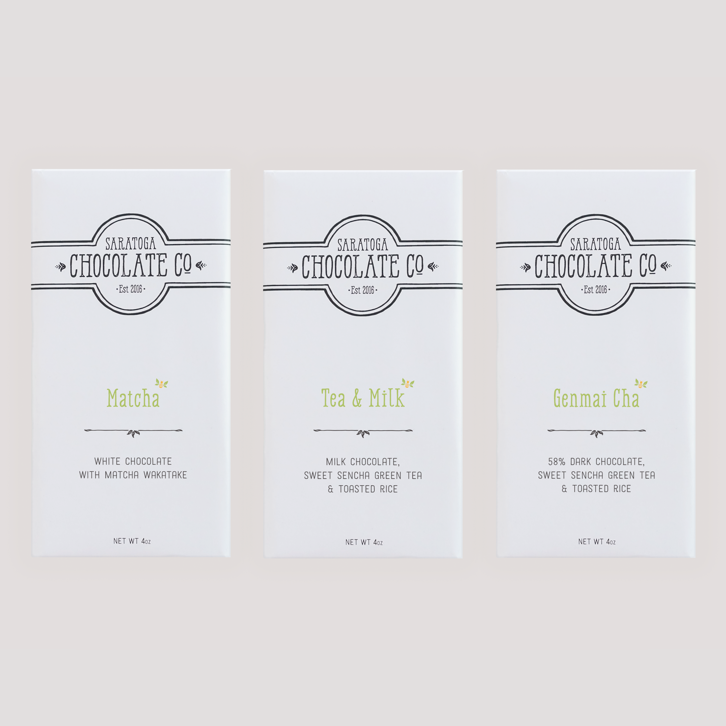 Saratoga Chocolate Co. Tea Collection featuring three chocolate bars inspired by tea, arranged in a square formation on a neutral background. Chocolates bars from left to right: Match, Tea and milk and Genmai Cha chocolate bars.