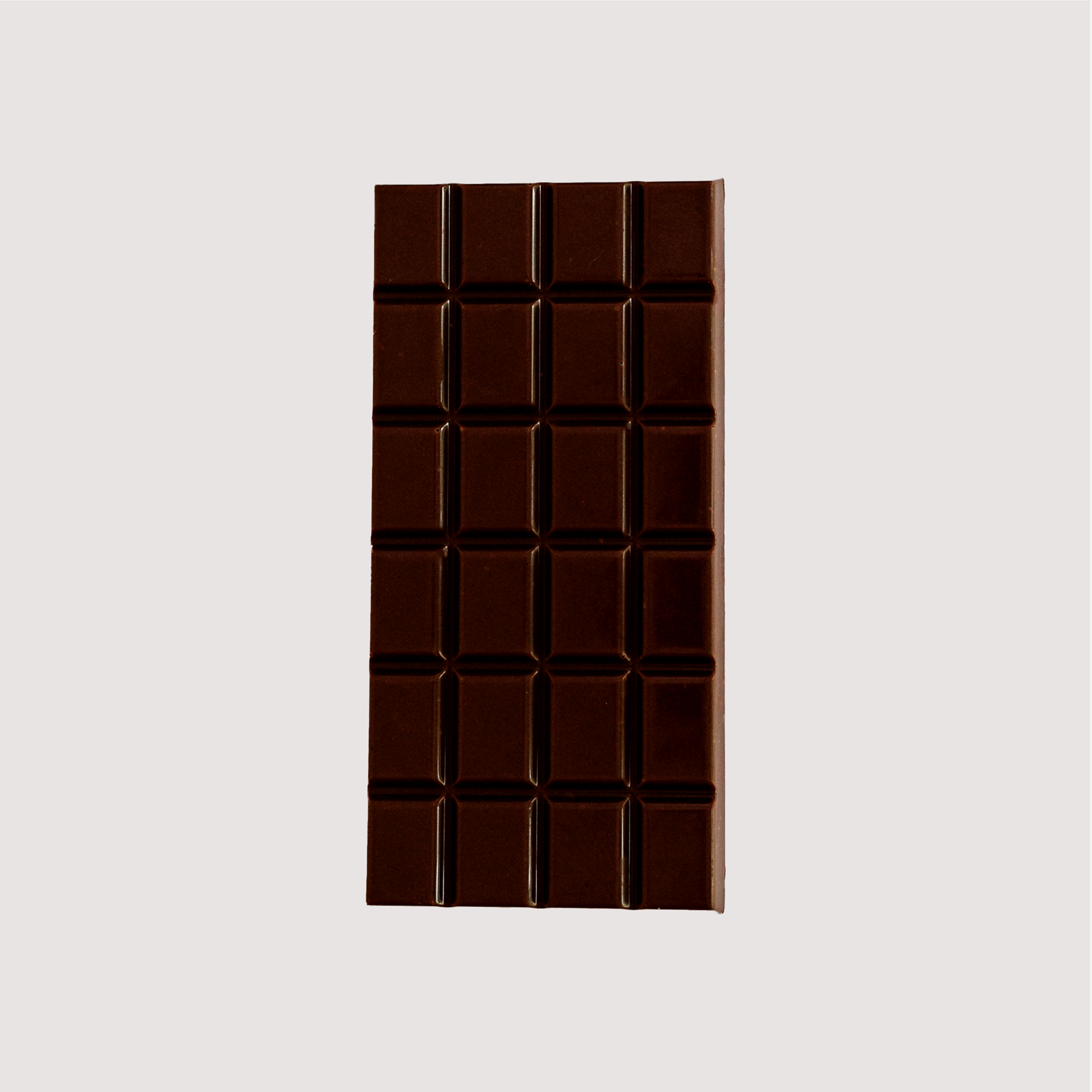 Unwrapped Saratoga Chocolate Co. Dark Crunch Bar, front side showing a smooth dark chocolate surface divided into 24 square segments. This bar is gluten and dairy free.