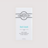 Front of Saratoga Chocolate Co. Dark Crunch Bar wrapped in a white paper package with a teal-colored flavor label. Label features the Saratoga Chocolate Co. logo and describes the bar as dark chocolate with crispy organic puffed brown rice and crunchy organic puffed quinoa. This bar is gluten and dairy free. 