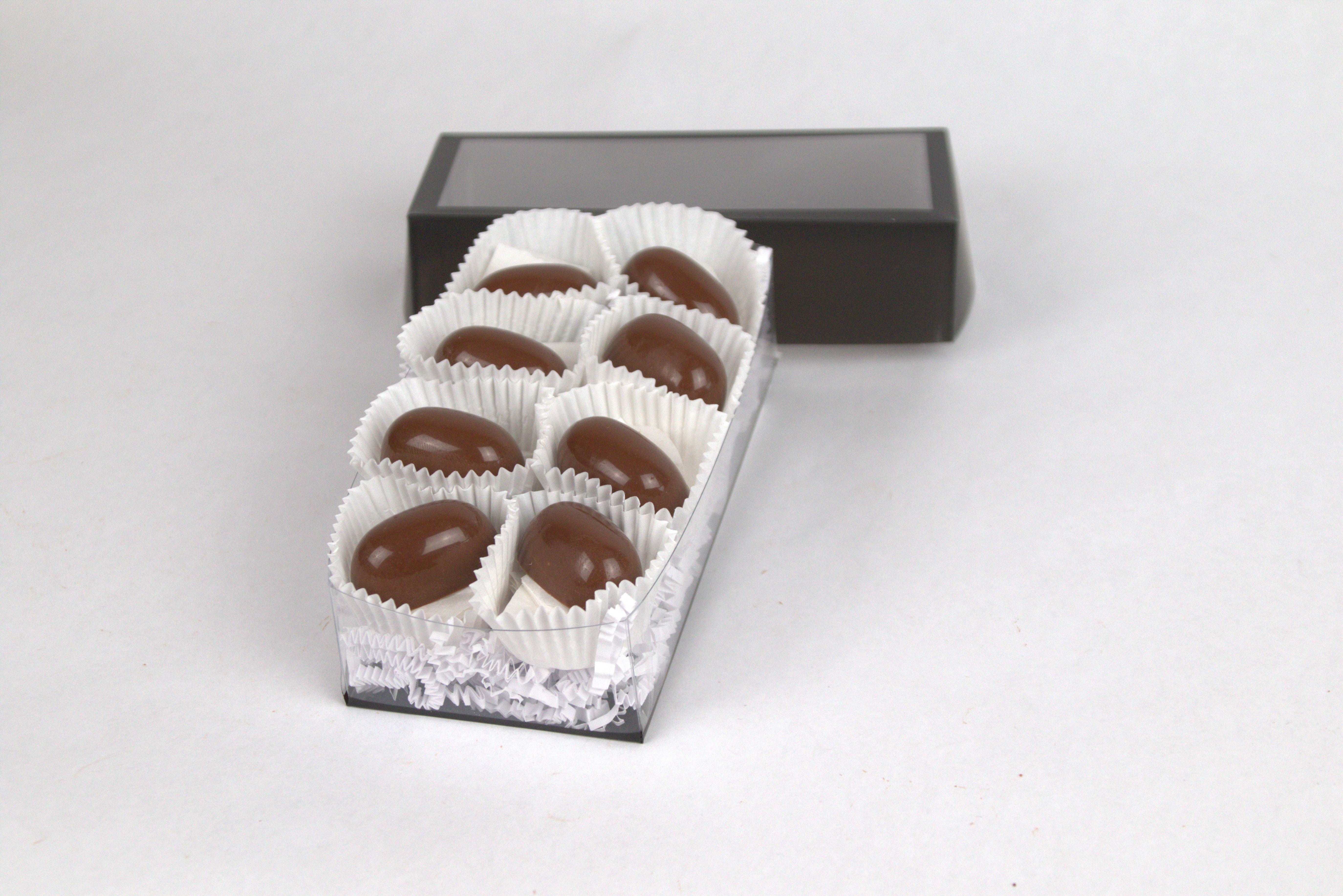 Box of eight Peanut Butter Milk Chocolate Truffles, each filled with creamy peanut ganache and coated in a smooth milk chocolate shell — a rich, indulgent treat for chocolate and peanut butter lovers from Saratoga Chocolate Co.