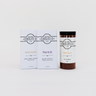 Saratoga Chocolate Co. Sugar & Spice Set featuring a 14-ounce jar of Mayan Spice Hot Chocolate Mix, labeled and sealed, alongside two 4-ounce chocolate bars—Fleur de Sel and Salted Caramel—wrapped in signature white paper with the Saratoga Chocolate Co. logo. The Mayan Spice Hot Chocolate is a bold dark chocolate blend infused with cinnamon, chili, and cayenne pepper. The Fleur de Sel Bar is dark chocolate with French sea salt, and the Salted Caramel Bar is creamy caramelized white chocolate with a touch of