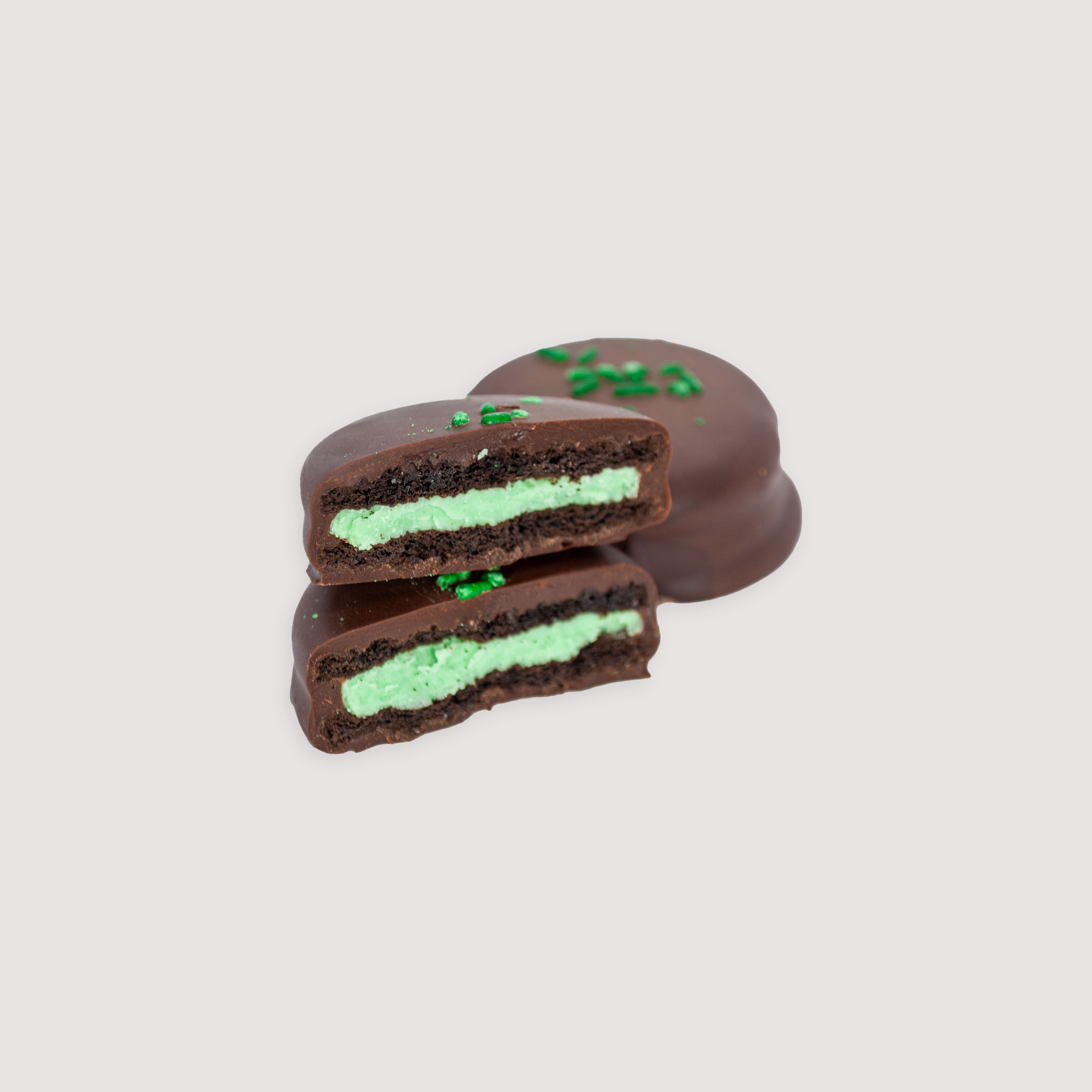 Saratoga Chocolate Co. dark chocolate-covered Oreo cookie with mint green cream filling. The cookie features a festive St. Patrick’s Day twist with crunchy cookie, smooth mint cream, and a coating of rich Velvet dark chocolate.
