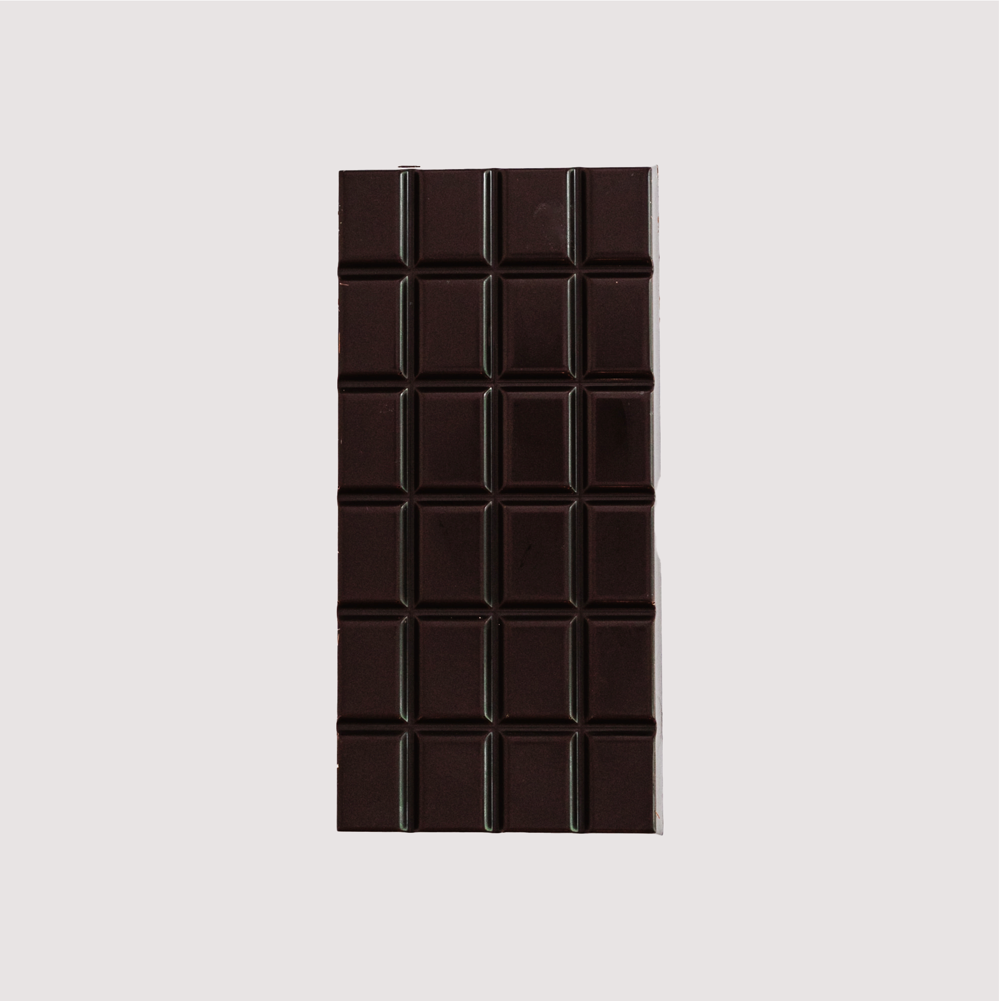 Unwrapped Saratoga Chocolate Co. Velvet Bar, front side showing a glossy dark chocolate surface divided into 24 square segments. This bar is vegan, gluten and dairy free.