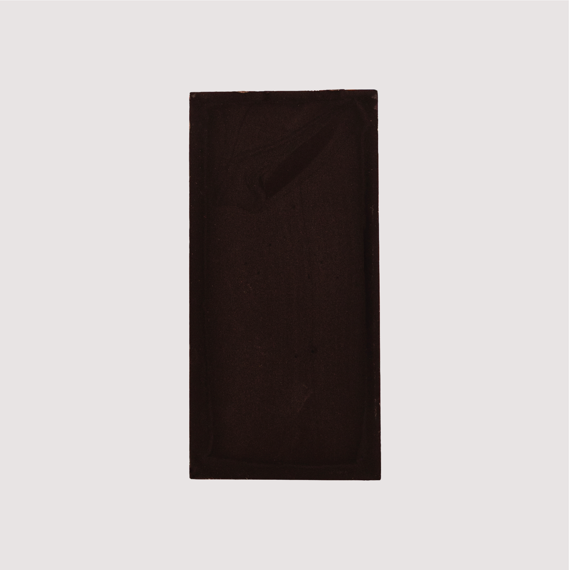 Unwrapped Saratoga Chocolate Co. Velvet Bar, back side showing a smooth dark chocolate surface. This bar is gluten and dairy free. This bar is vegan, gluten and dairy free.
